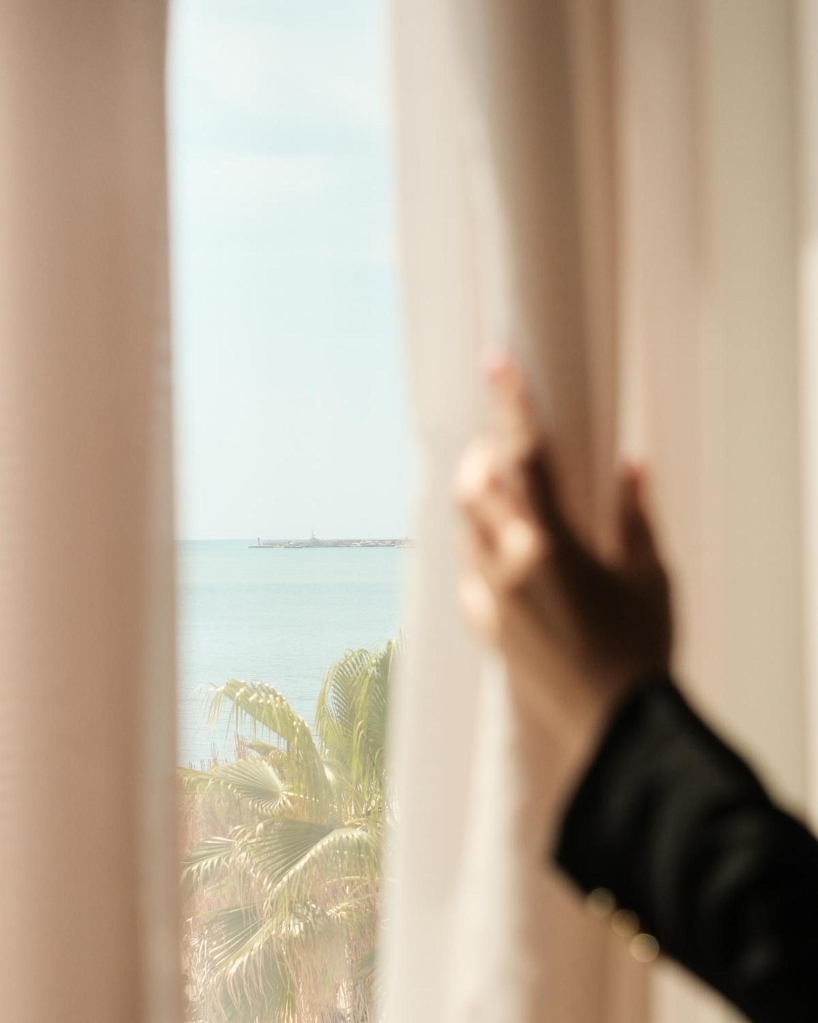 Dreibettzimmer mit Meerblick